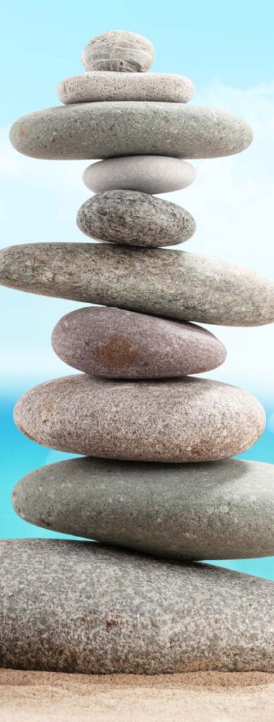 A tall cairn of ten perfectly balanced small stones.