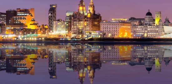 A view across the Liverpool Waterfront with the iconic Liver Building at the centre.