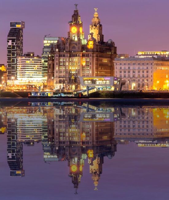 A view across the Liverpool Waterfront with the iconic Liver Building at the centre.